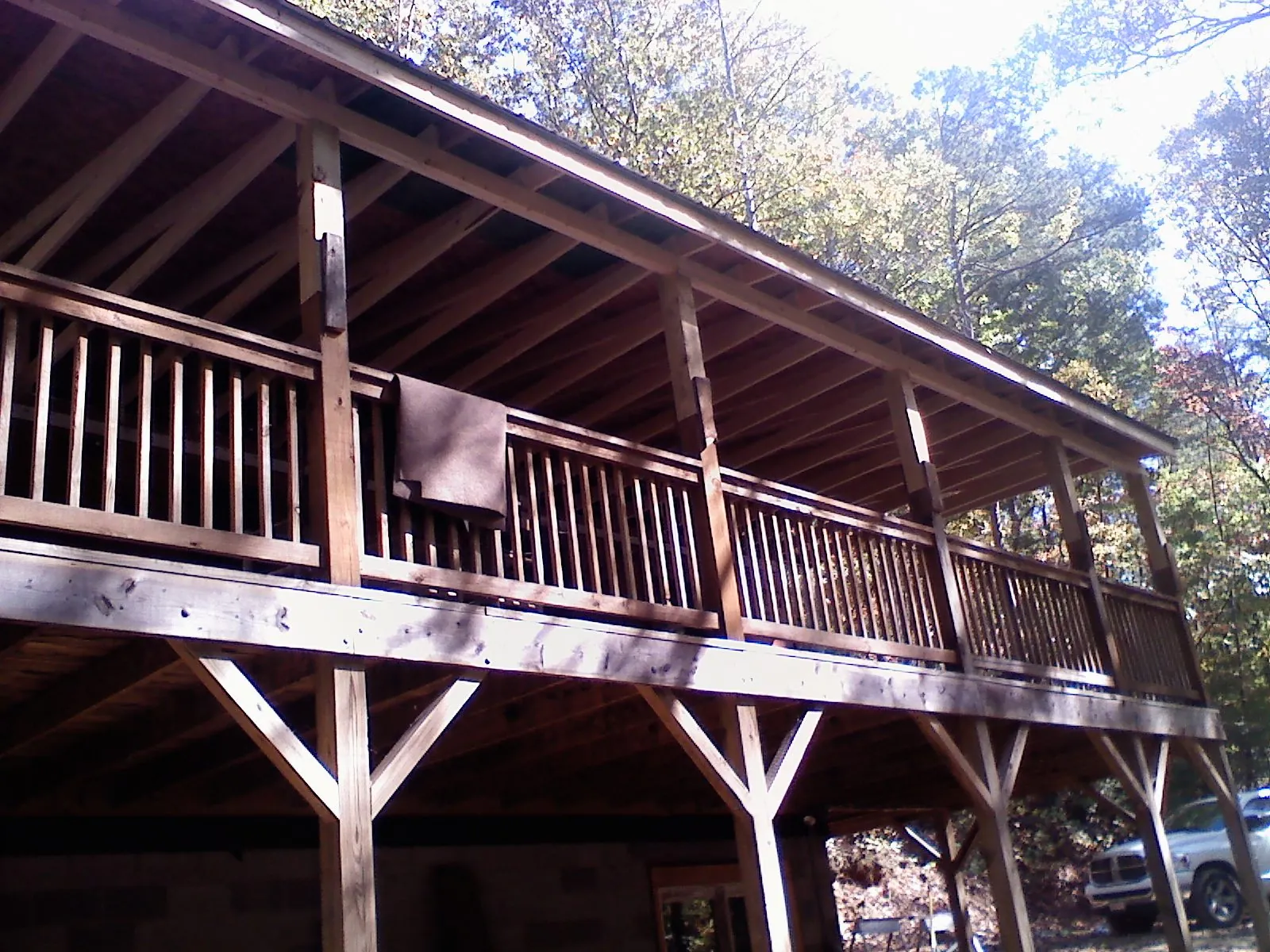 Timber framing under a new elevated porch and deck — Roof Leak Repair in Stirum by Roofing Brothers